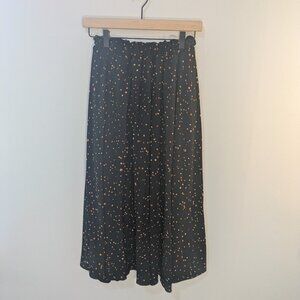 Black polka dot skirt
